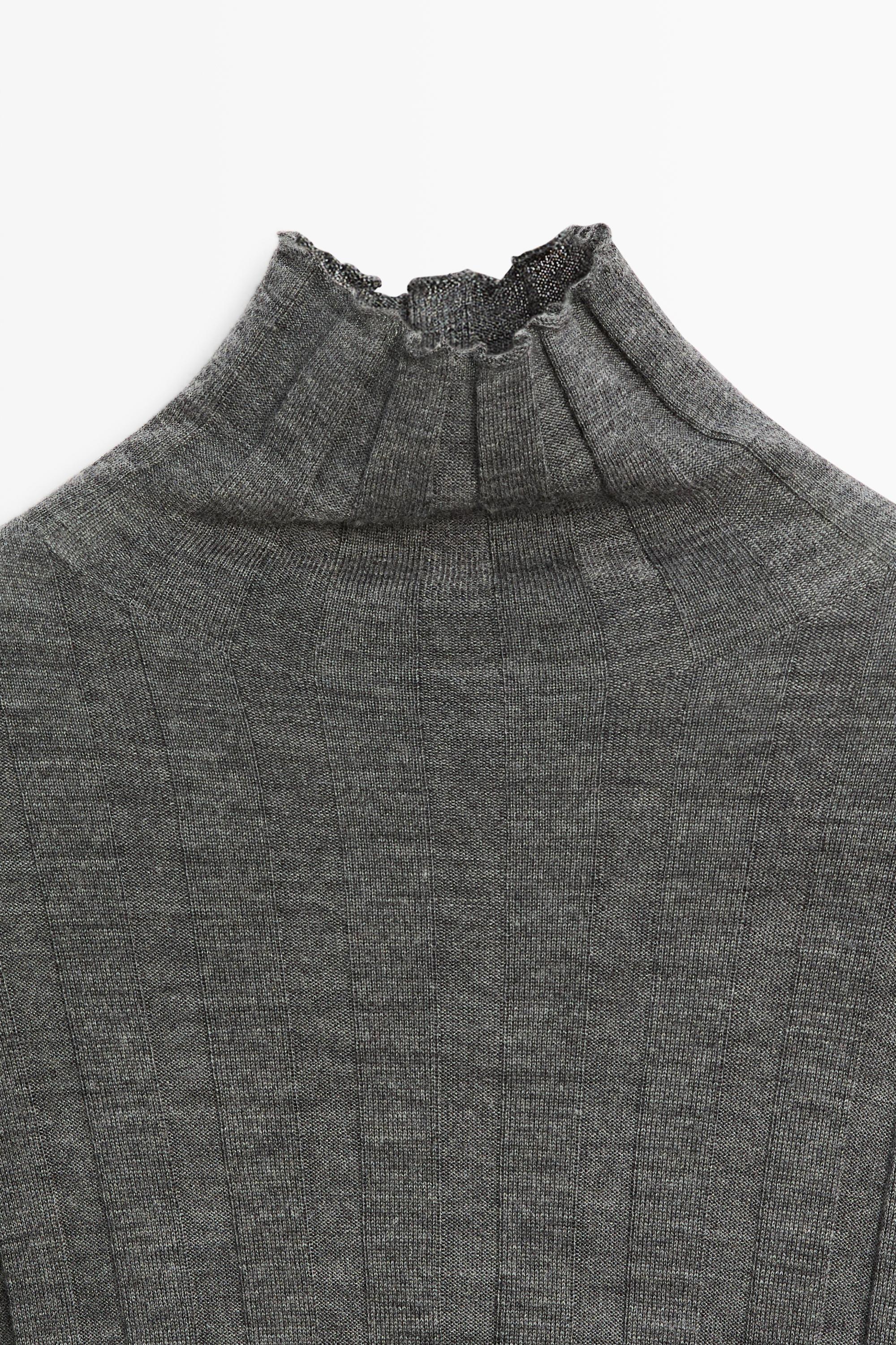 Ribbed mock turtleneck knit sweater