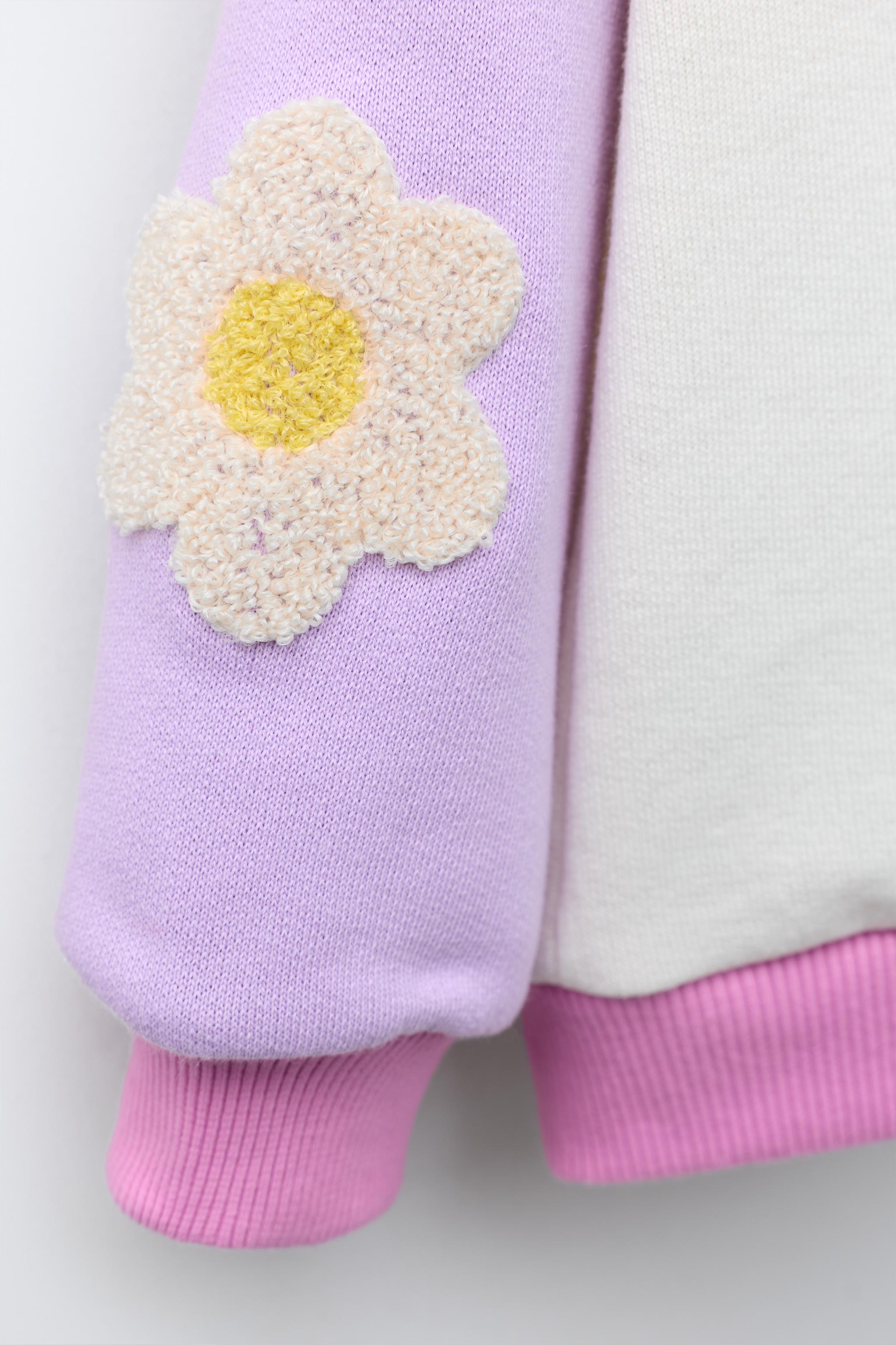 CONTRASTING SLEEVE FLORAL SWEATSHIRT