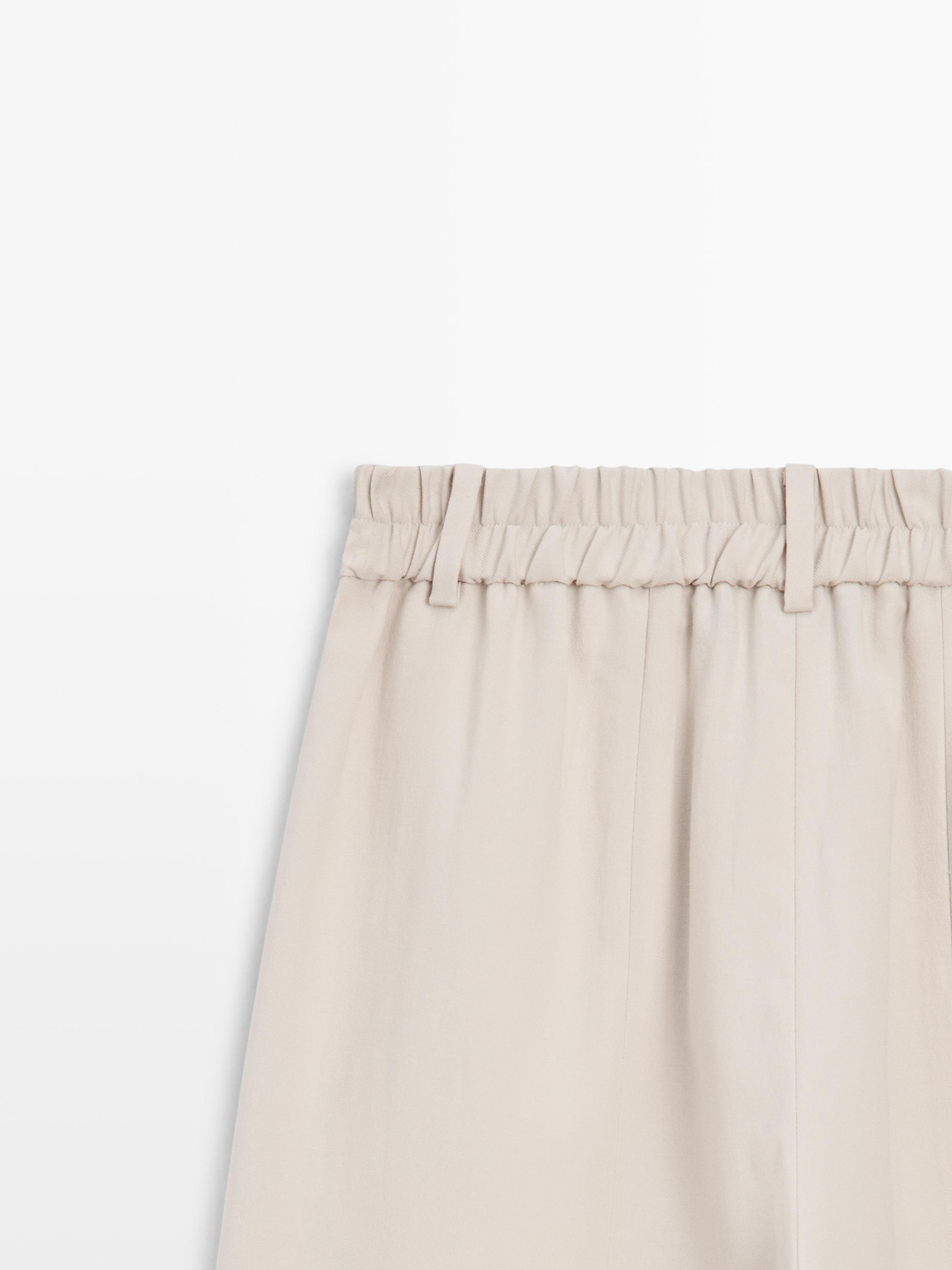 Flowing pants with elasticated waistband
