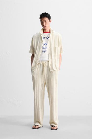 OPEN TEXTURED TROUSERS - Ecru by Zara