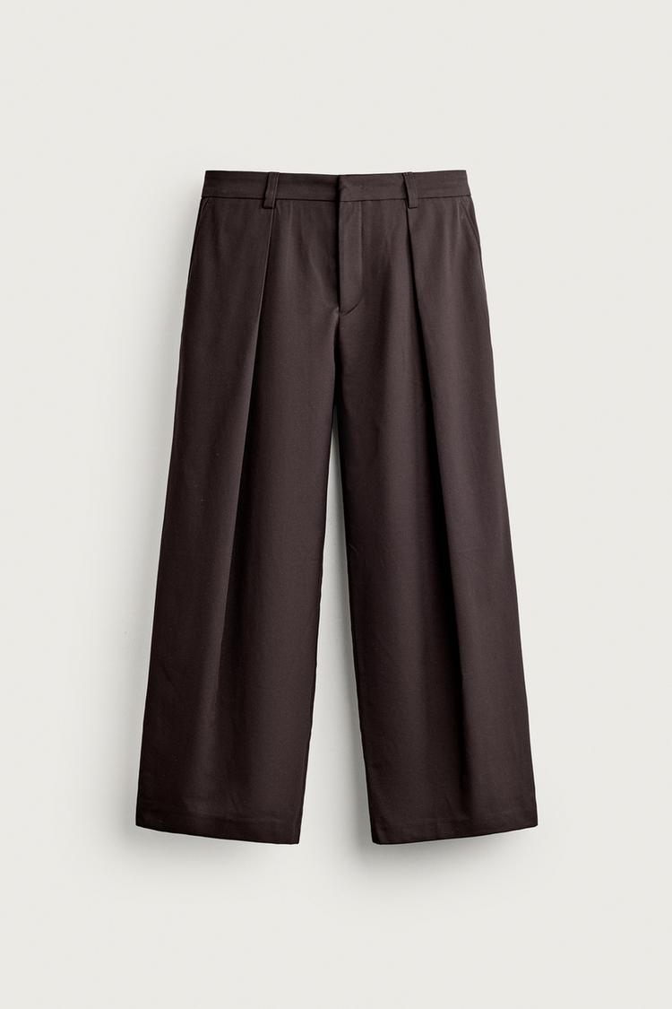 Pantalon wide fit pliegues invertidos