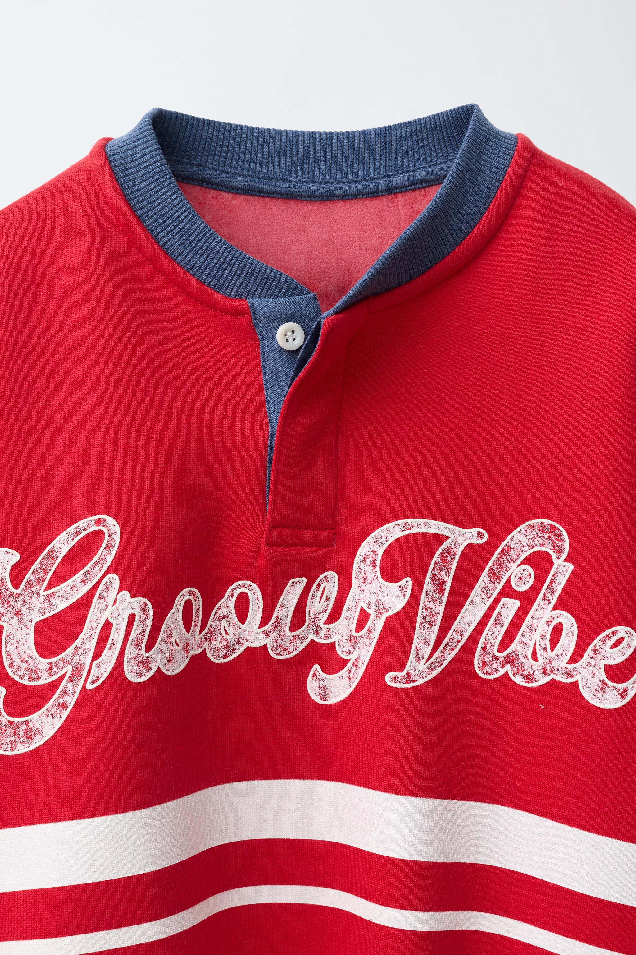 TEXT HENLEY SWEATSHIRT
