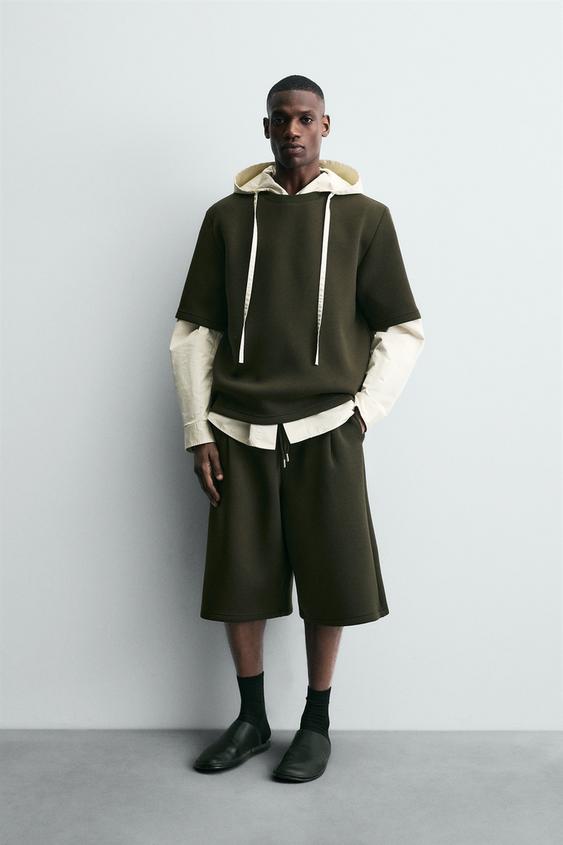 NEOPRENE EFFECT STUD SWEATSHIRT