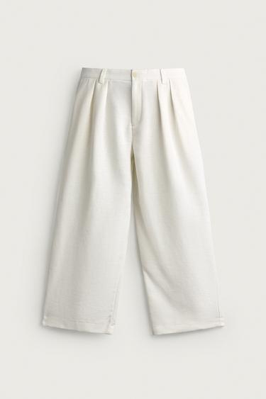 PANTALÓN RELAXED FIT ESTRUCTURA PLIEGUES - Blanco de Zara