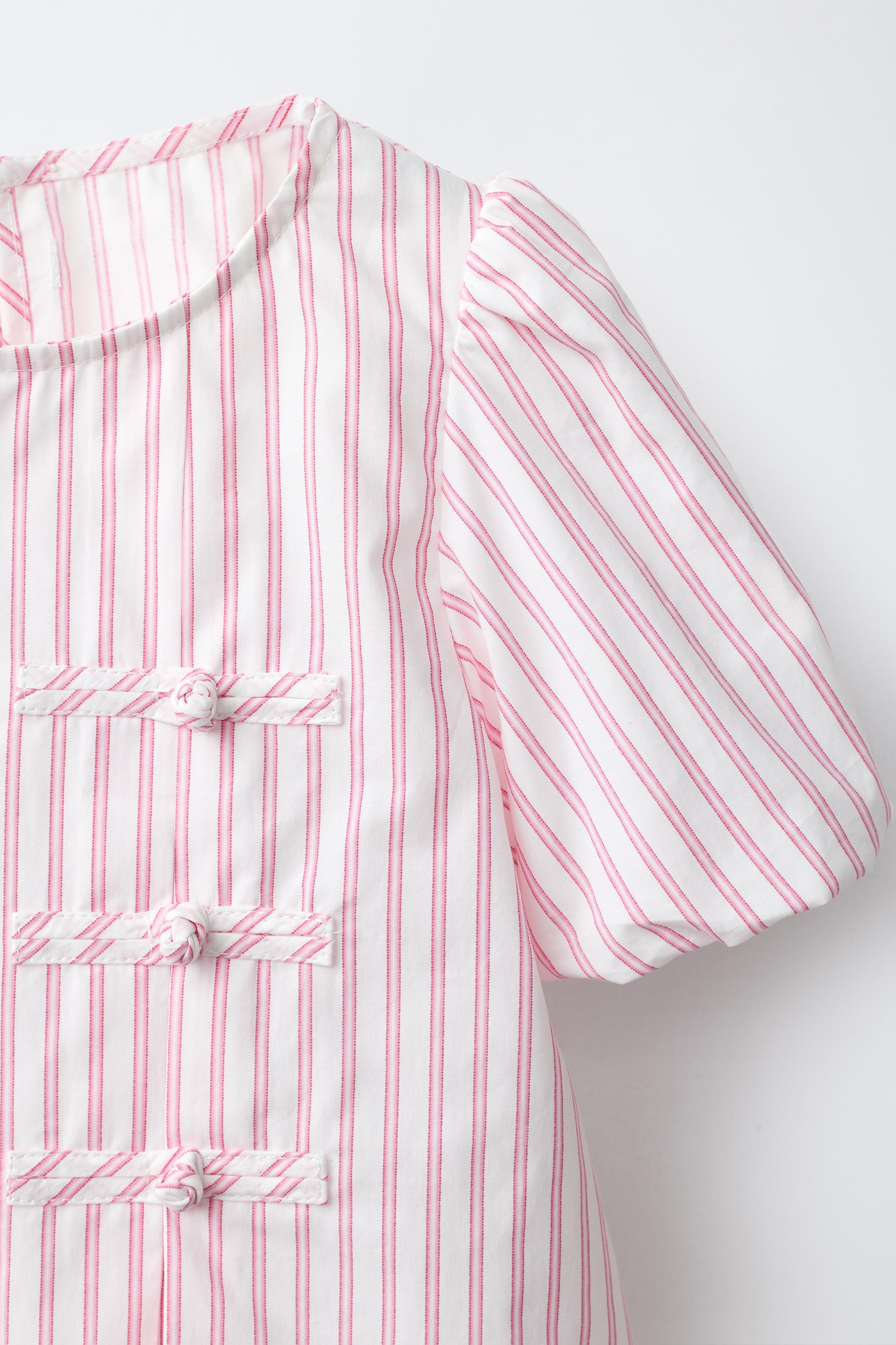 BLOUSE À RAYURES ET BRANDEBOURGS