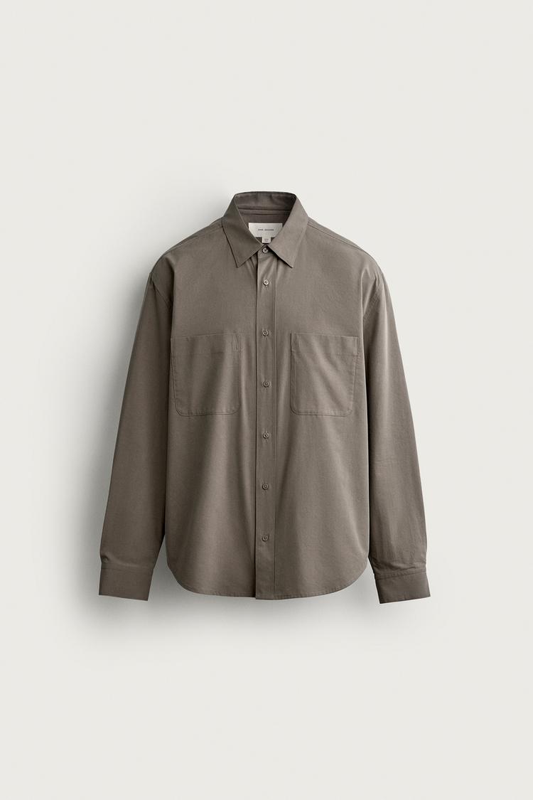 Camisa relaxed fit bolsillos