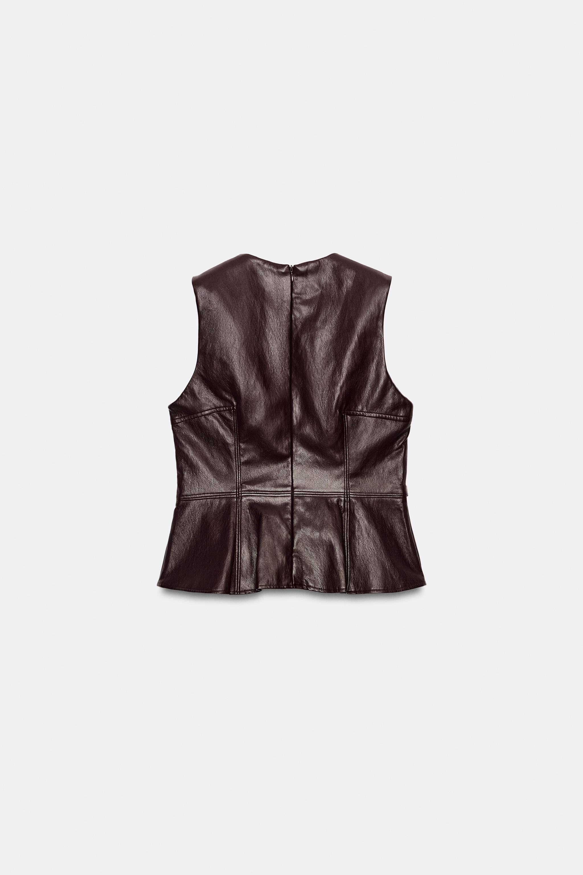 FAUX LEATHER TOP WITH GOLD-TONE APPLIQUÉS