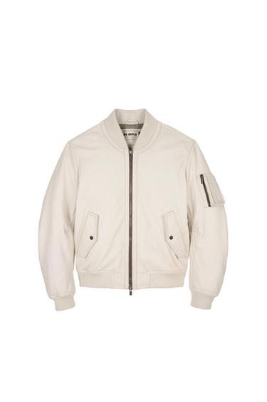 White bomber jacket with front zip, flap and button pockets, and sleeve pocket. Visible inside label: "ZARA SRPLS".