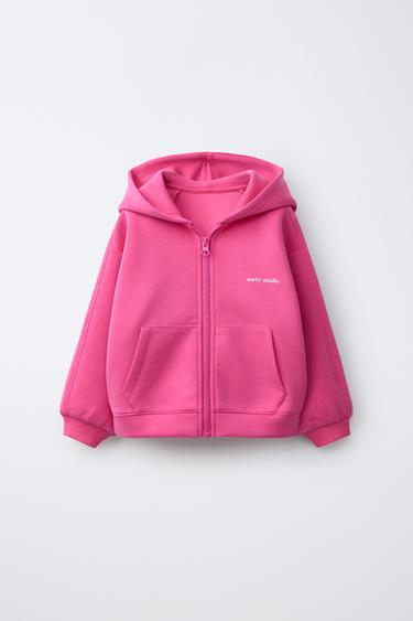 SWEATSHIRT RITSLETING TEKS RELIEF - Fusia dari Zara