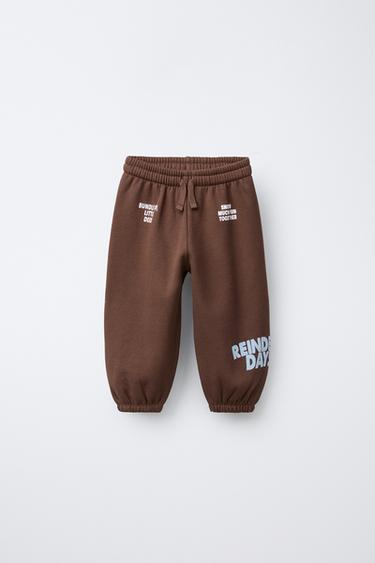Zara FLOCKED TEXT JOGGER PANTS - Brown - Image 0
