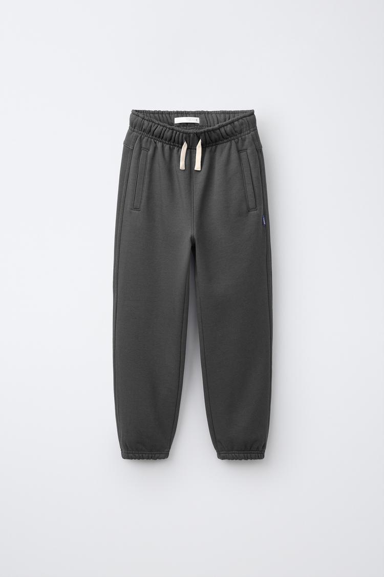 Pantalon jogger liso etiqueta