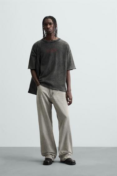 CAMISETA LAVADA PUNTO ESTAMPADO - Negro de Zara - Imagen 0
