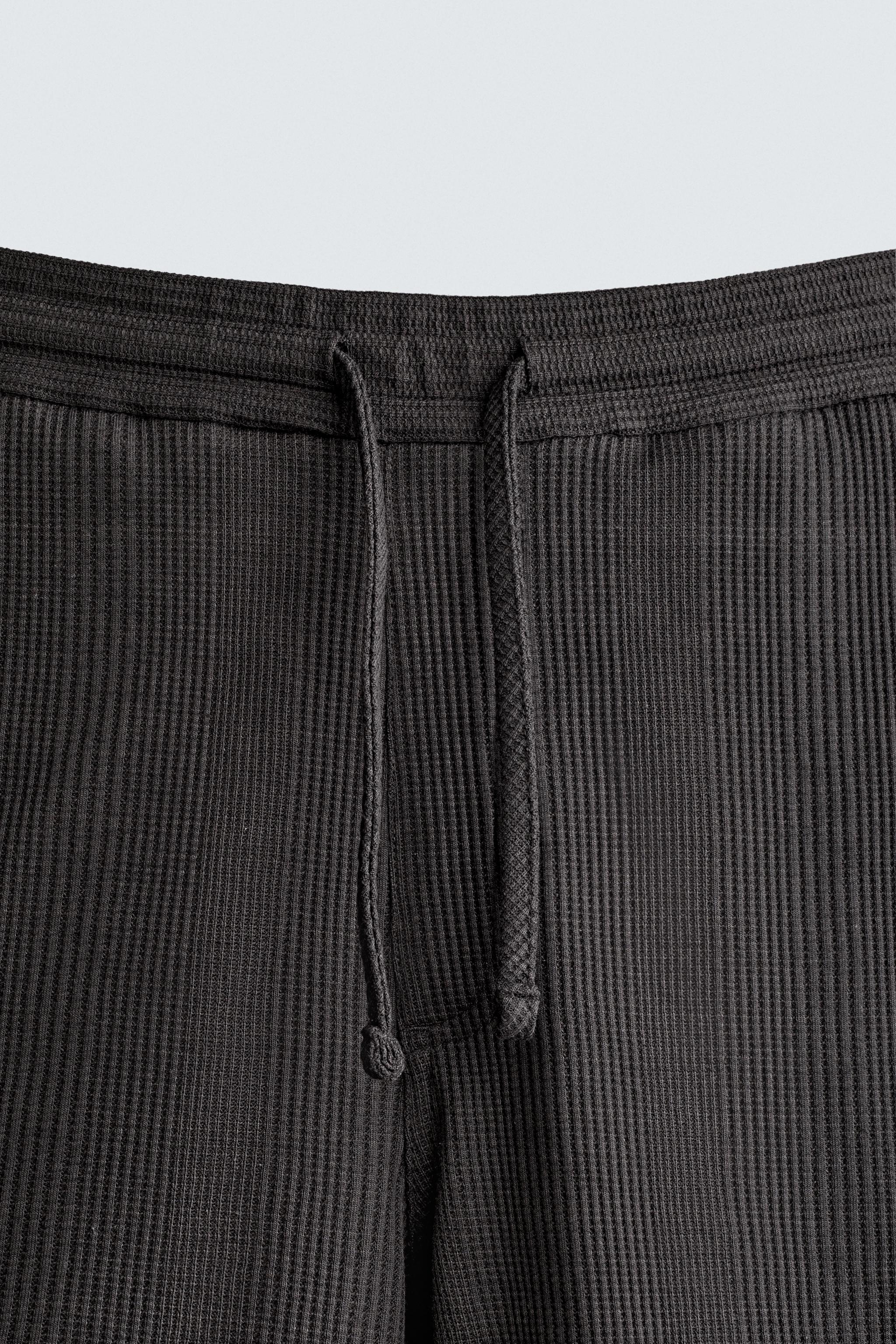 TEXTURED RELAXED FIT SHORTS