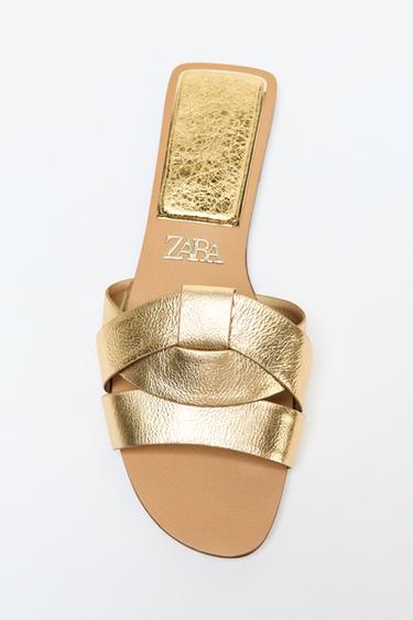 FLAT CRISS-CROSS LEATHER SLIDER SANDALS - Gold by Zara