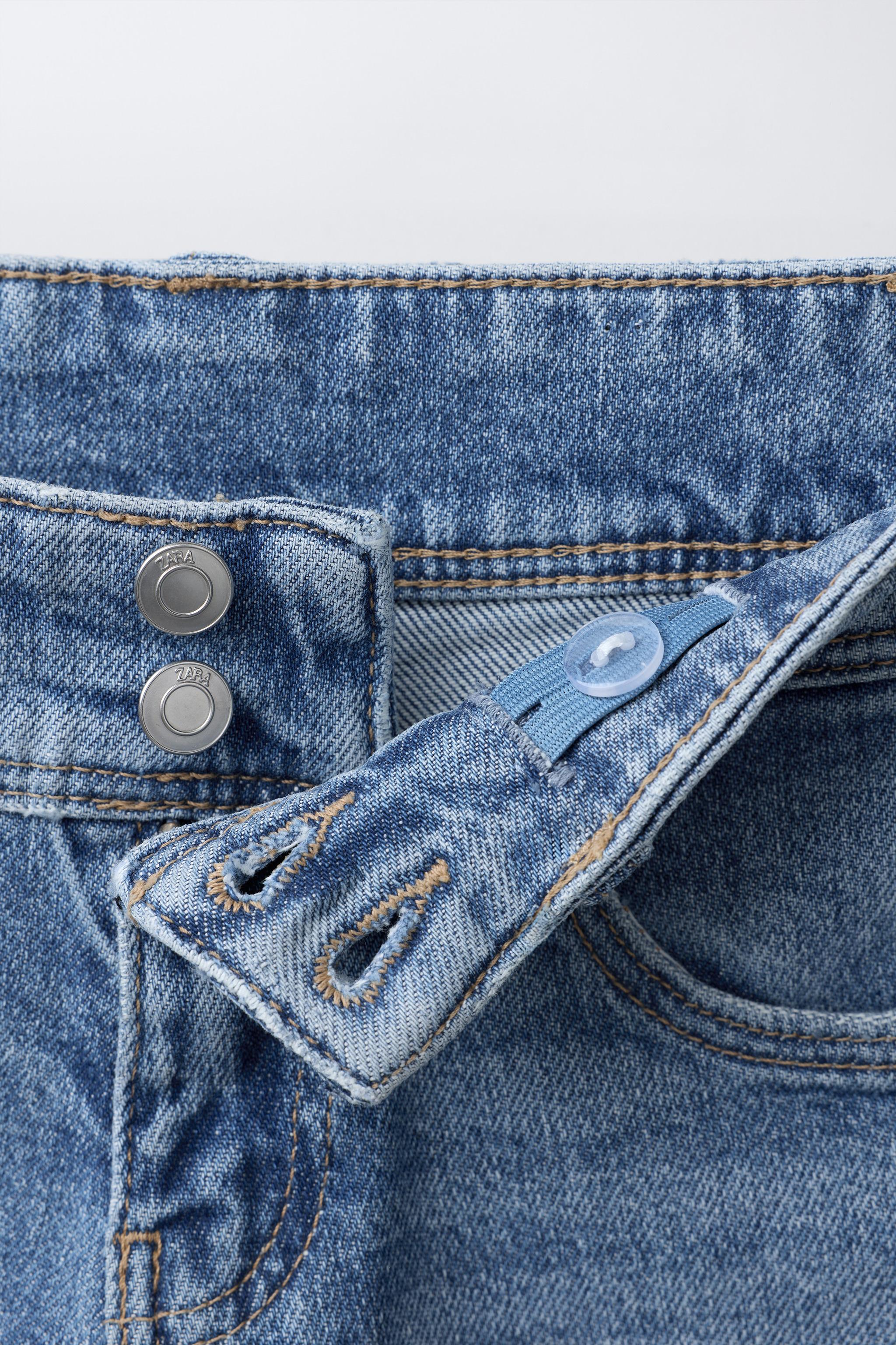 DOUBLE BUTTON FLARE JEANS