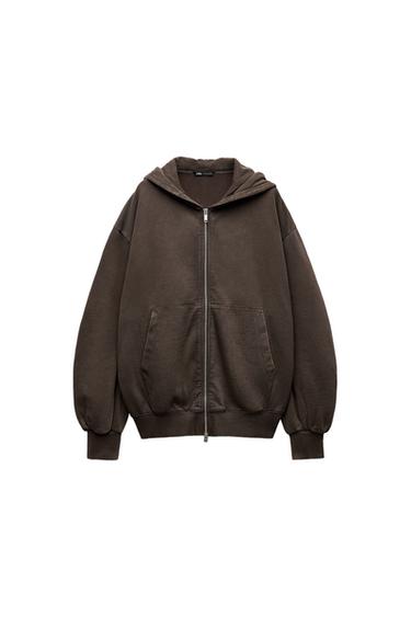 Front view of a brown zip-up hoodie with a hood and front pockets.