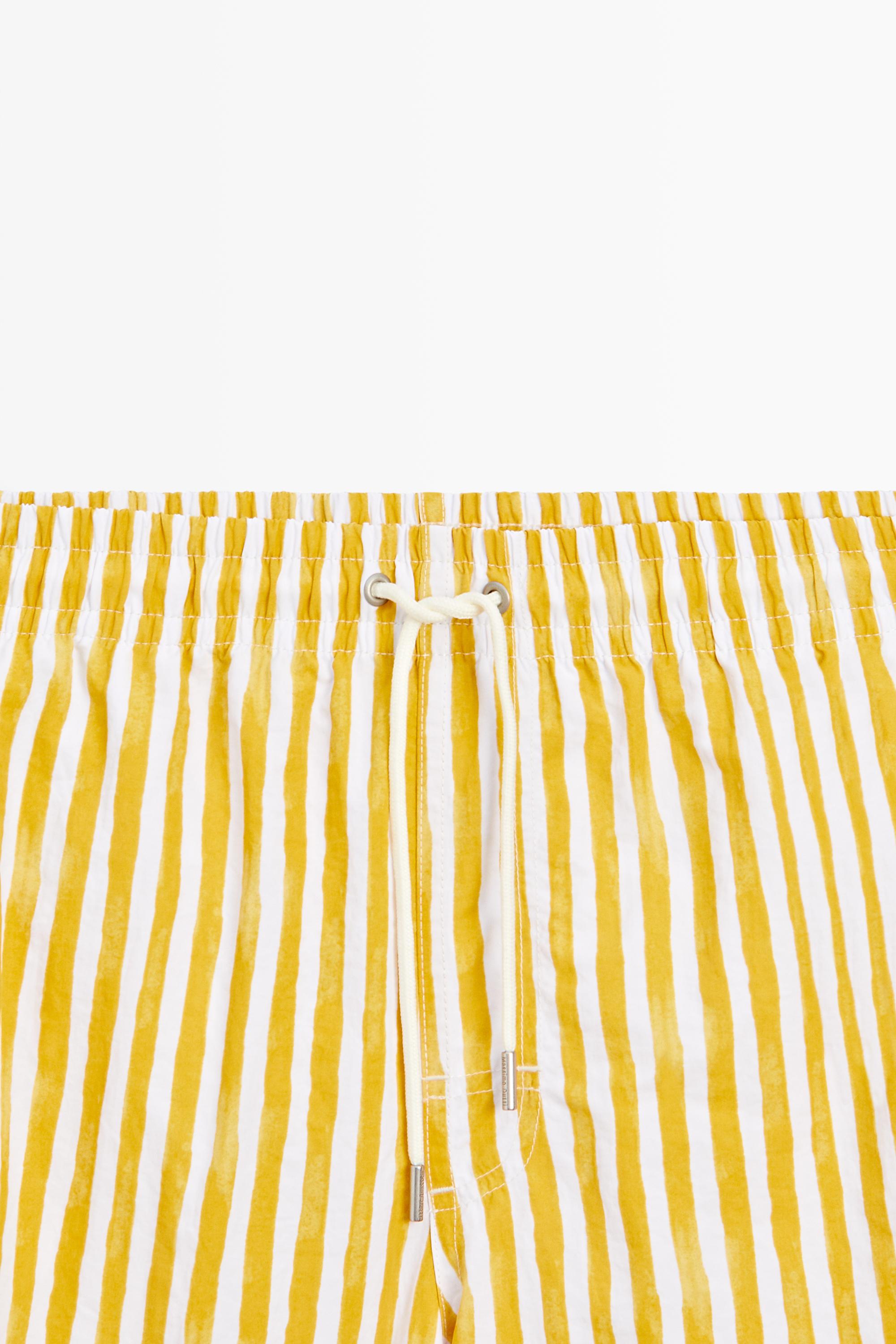 Striped printed swimming trunks — Yellow