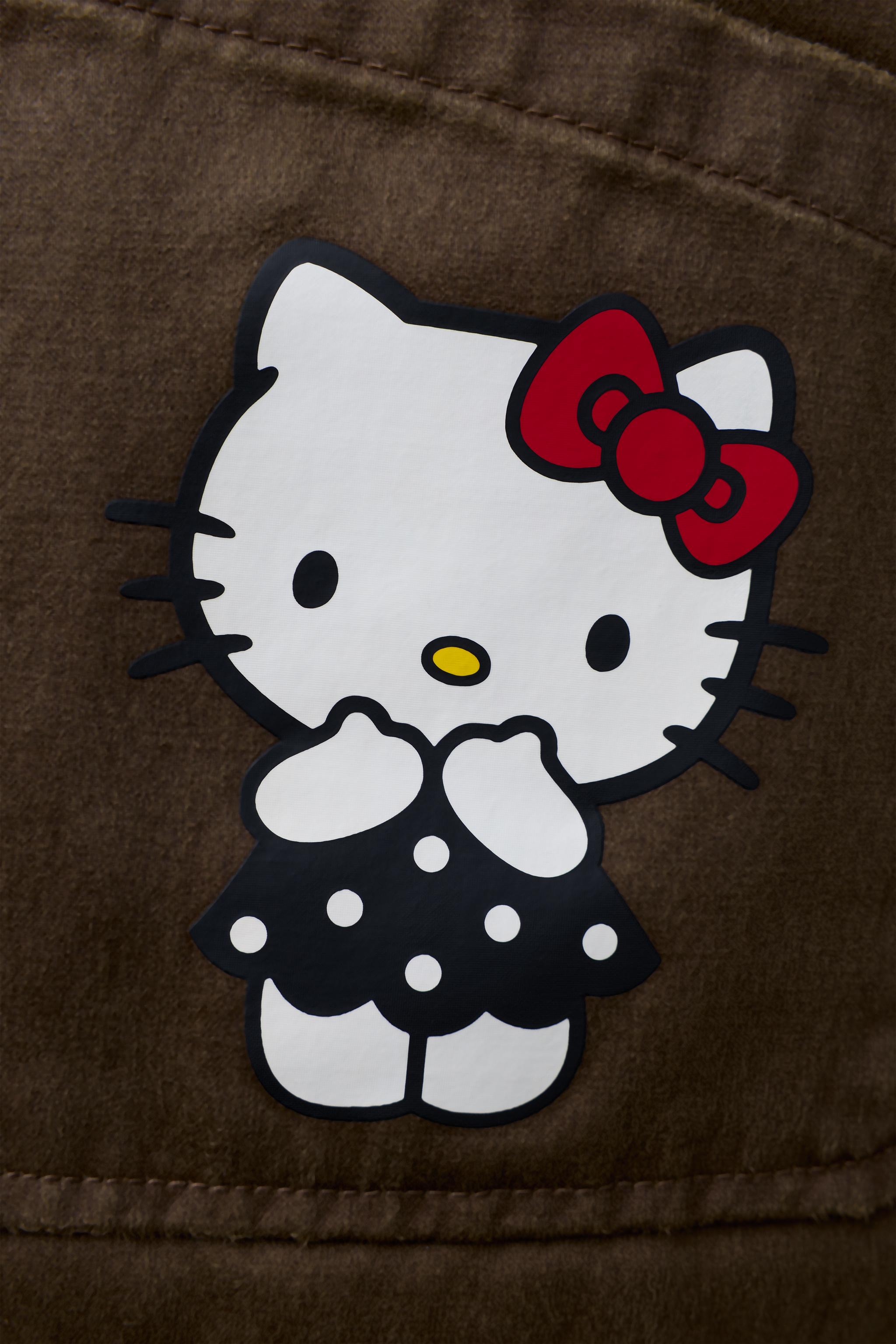 HELLO KITTY © SANRIO ワックス加工ジャケット - ミンクブラウン