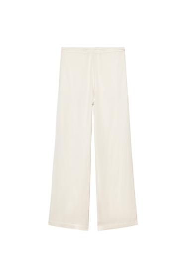 Front view of beige wide leg pants