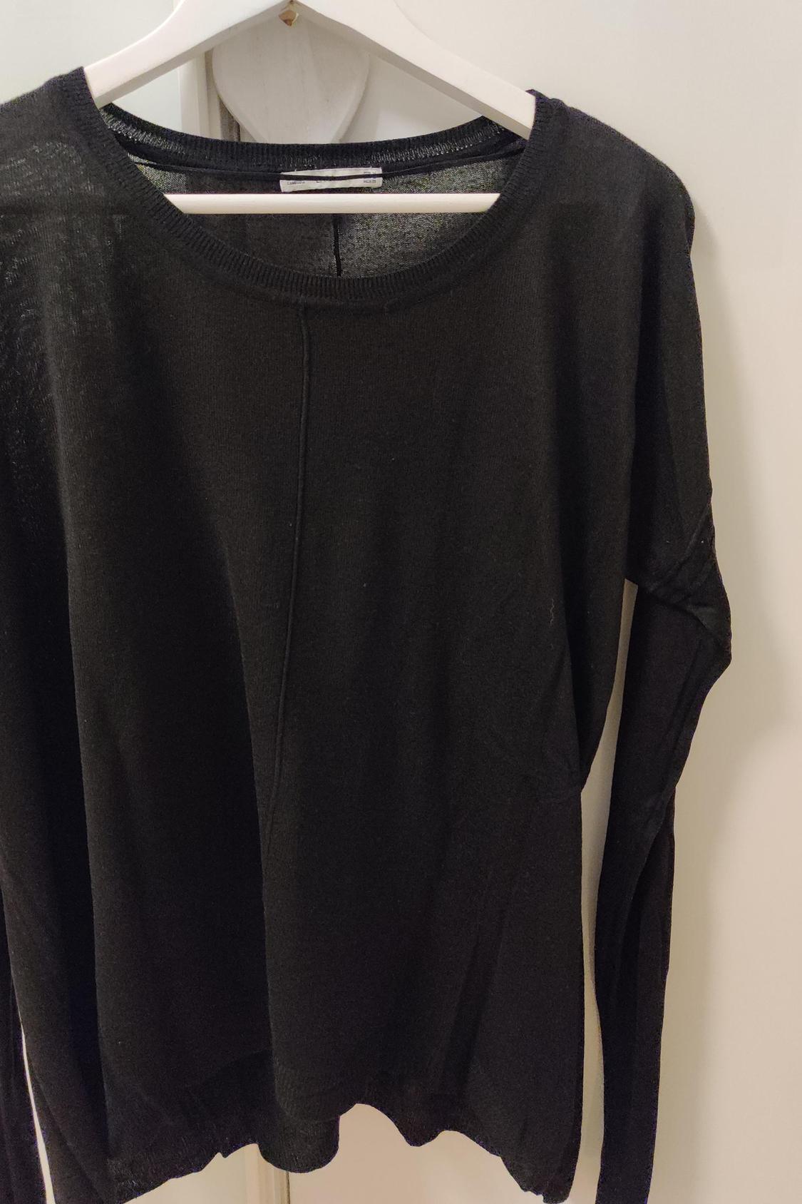 Front view of a black long-sleeved crew-neck t-shirt.