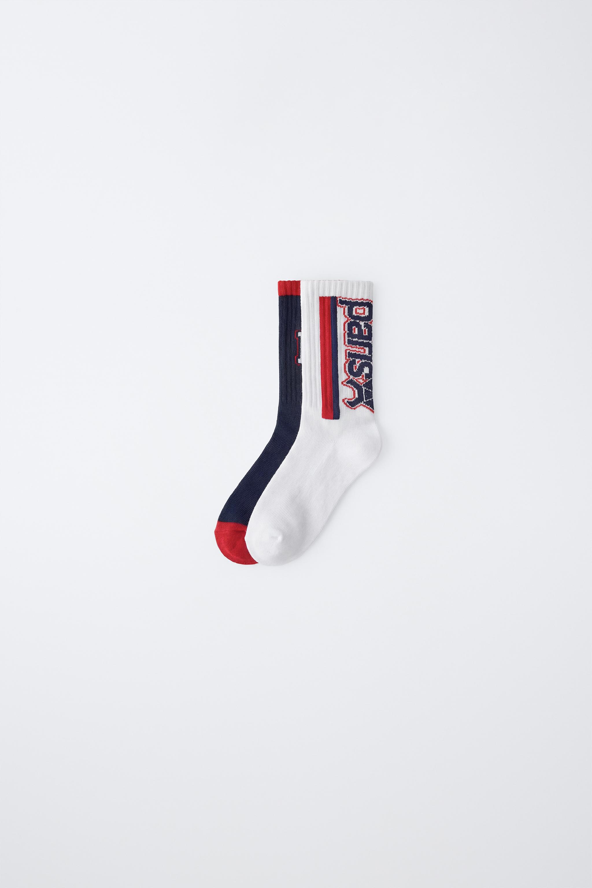 LOT DE DEUX CHAUSSETTES MONTANTES PSG ®