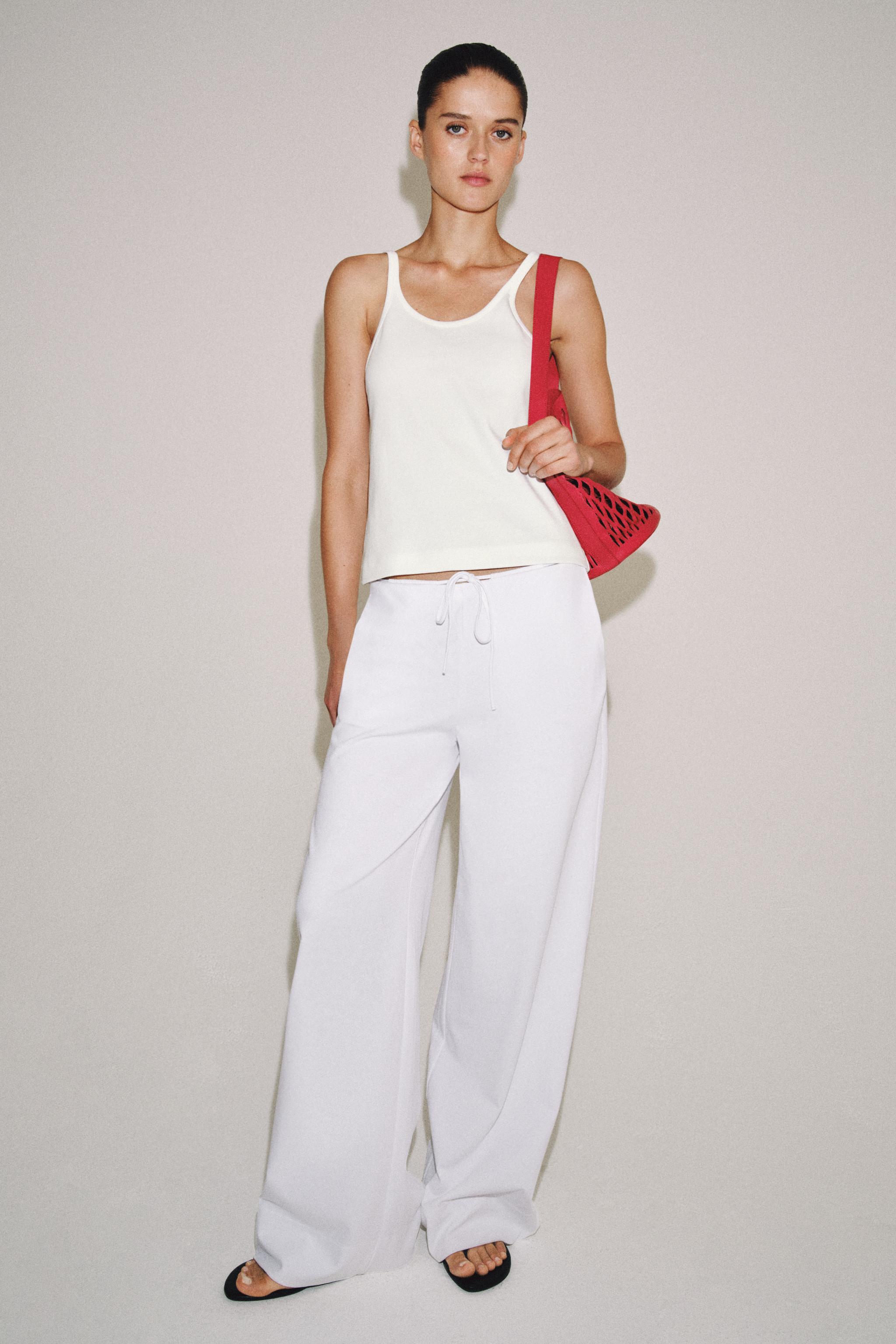 INTERLOCK STRAP TOP