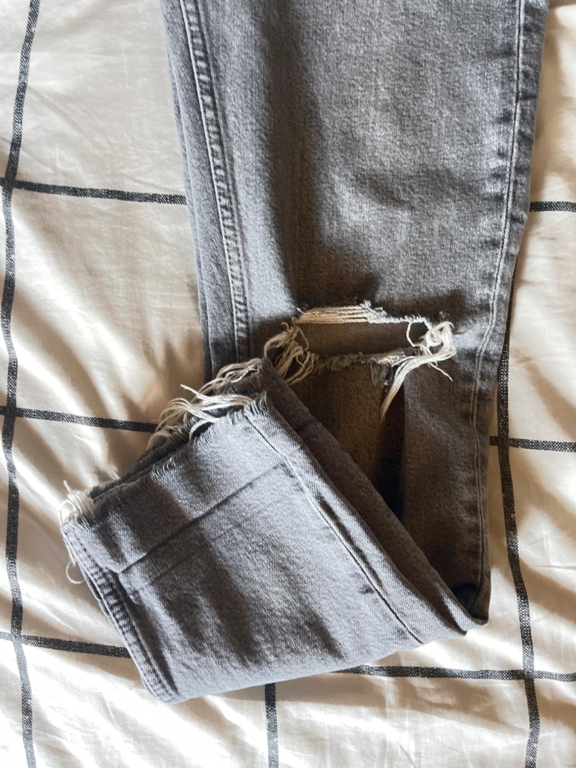 SLIM STRAIGHT JEANS WITH KNEE RIPS - Image 3