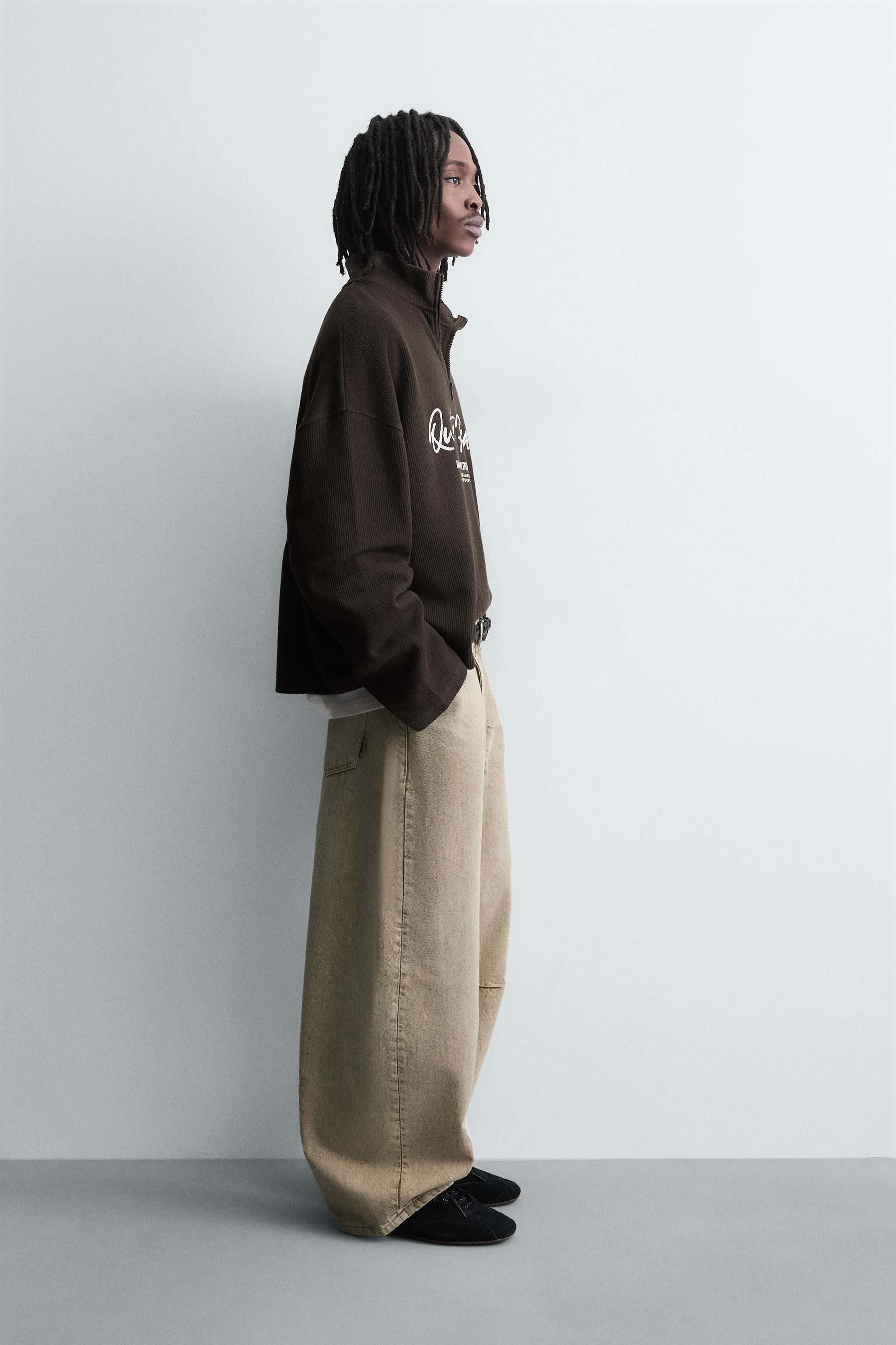 SWEAT IMPRIMÉ COL ZIPPÉ