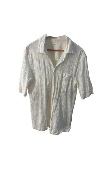 CAMISA DE COLOR BLANCO