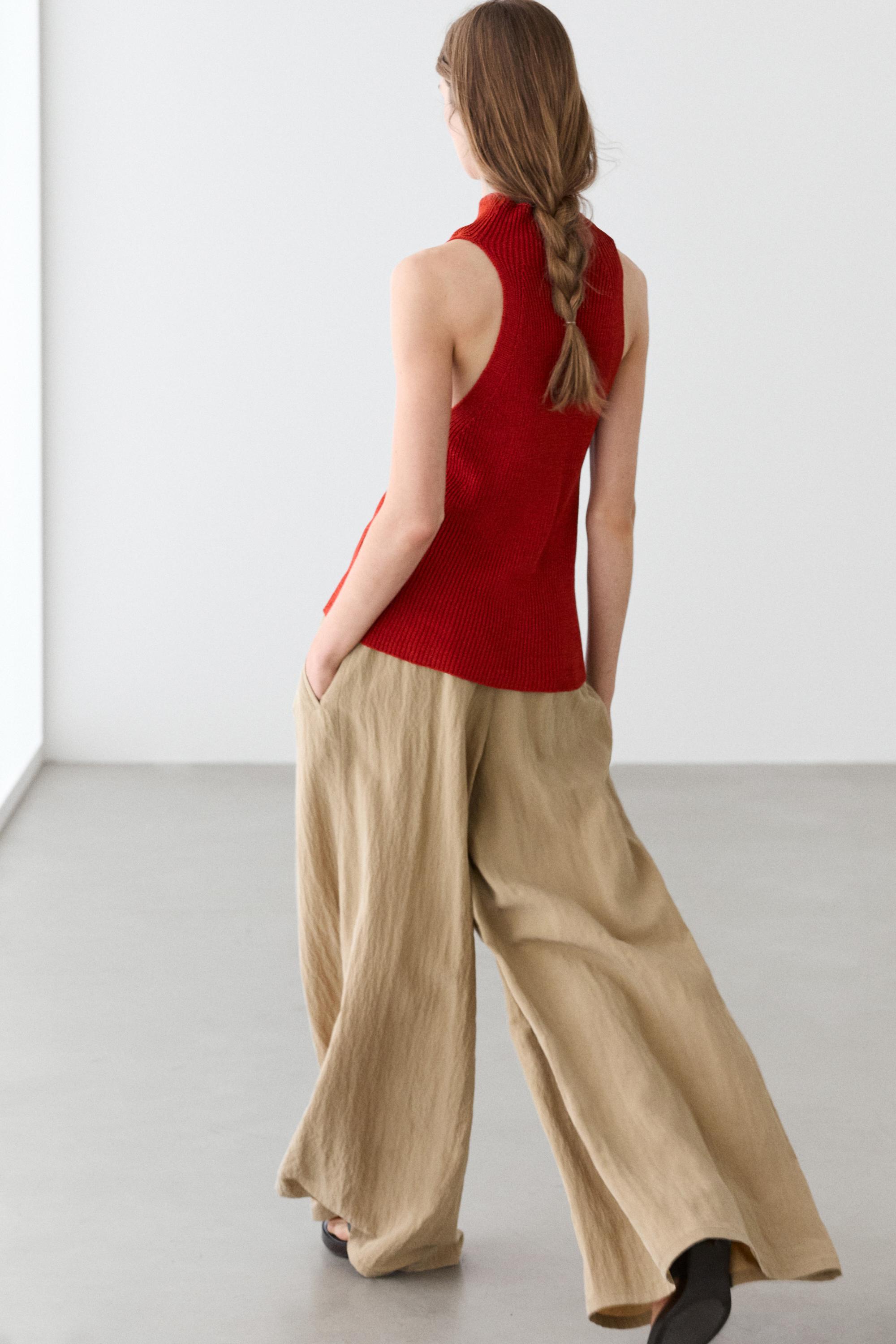 Palazzo trousers with box pleats