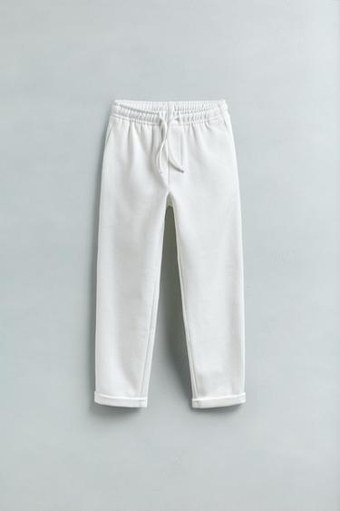 بنطلون مستقيم COMFORT - أبيض مكسور الخاص بـ Zara