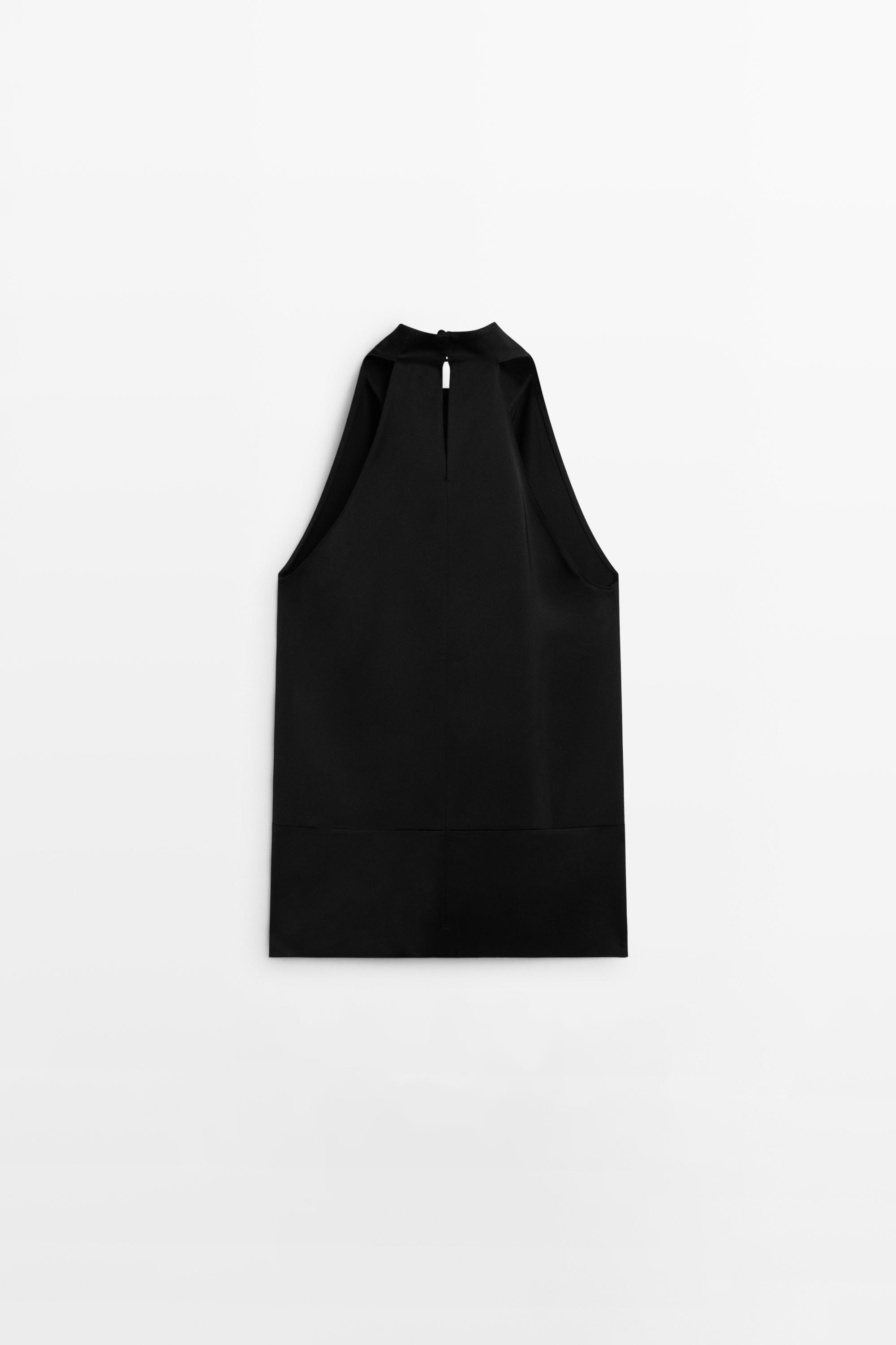 Flowing halter neck top with waistband effect