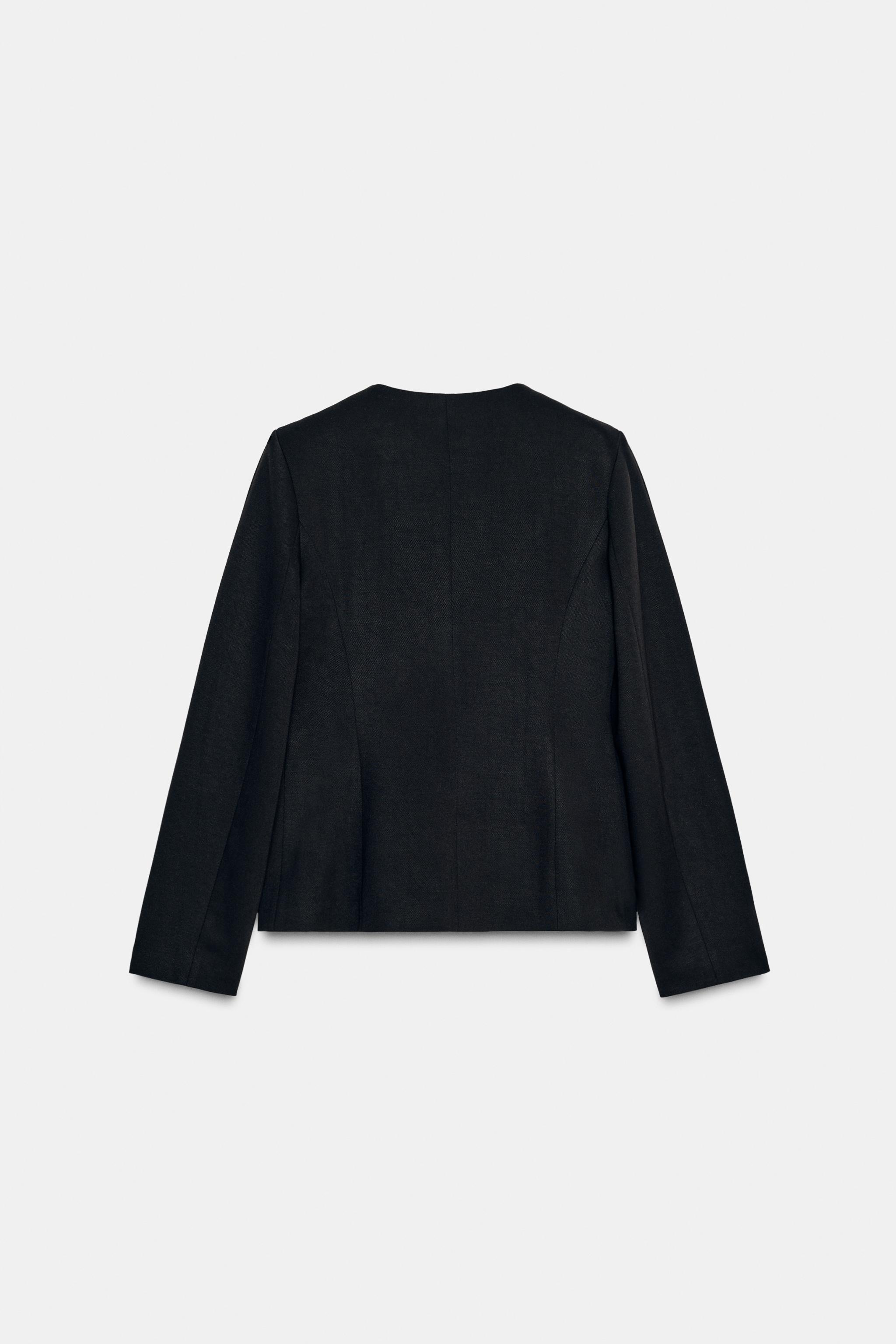 VESTE COURTE À ÉPAULETTES