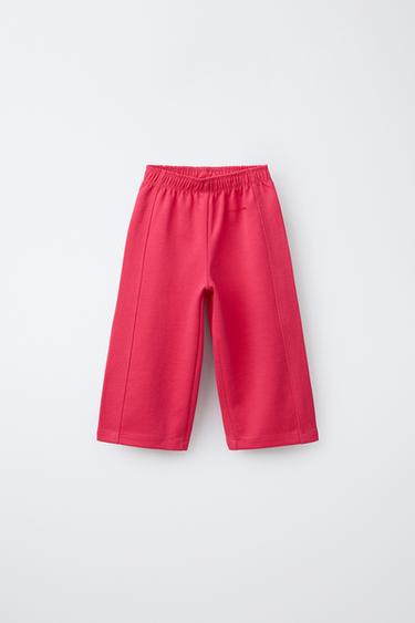 WIDE-LEG INTERLOCK TROUSERS WITH RAISED SLOGAN - Strawberry by Zara