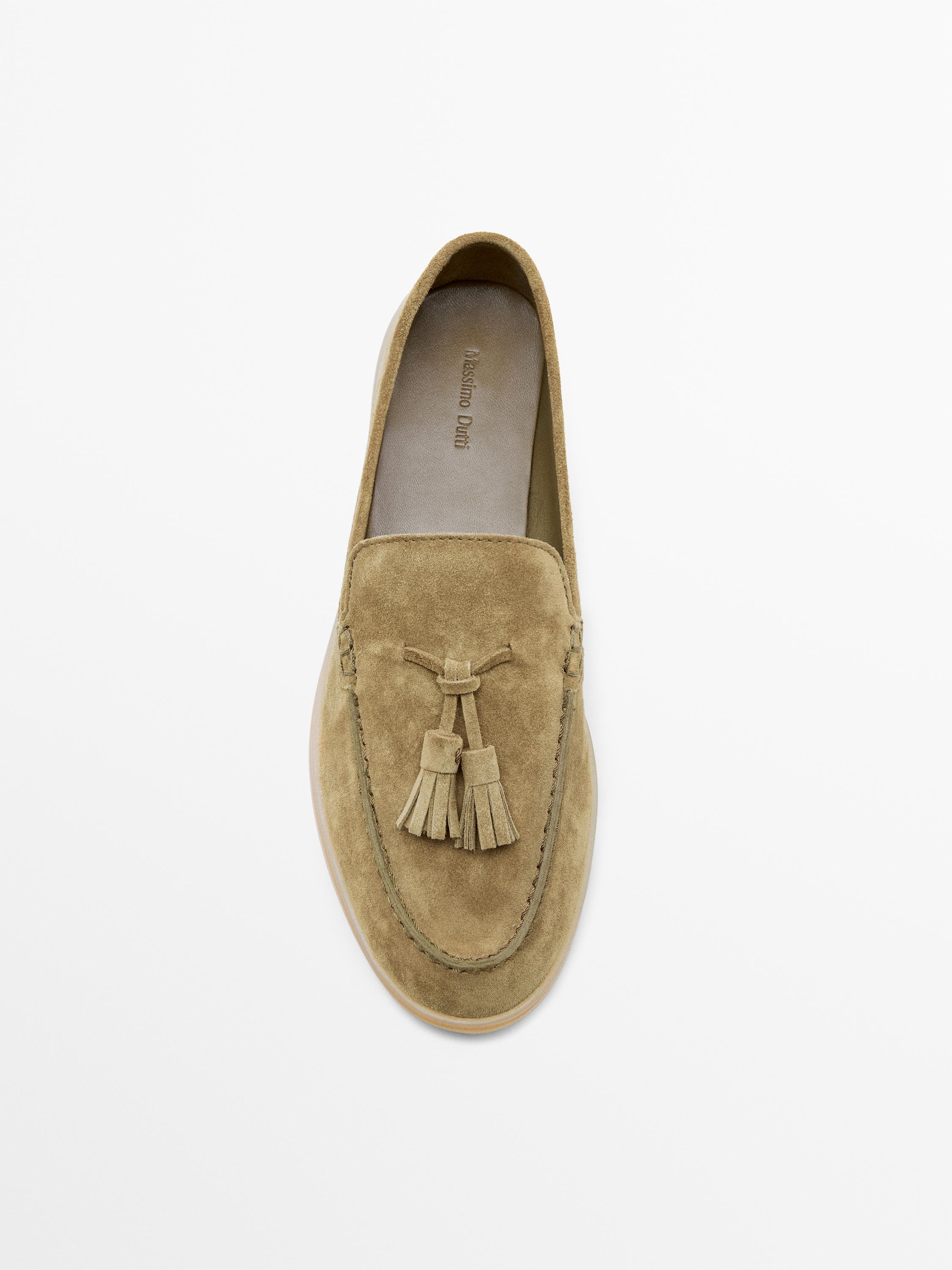 Split leather loafers with tassels