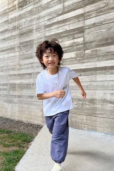 T-SHIRT WITH RAISED SLOGAN - Oyster-white by Zara