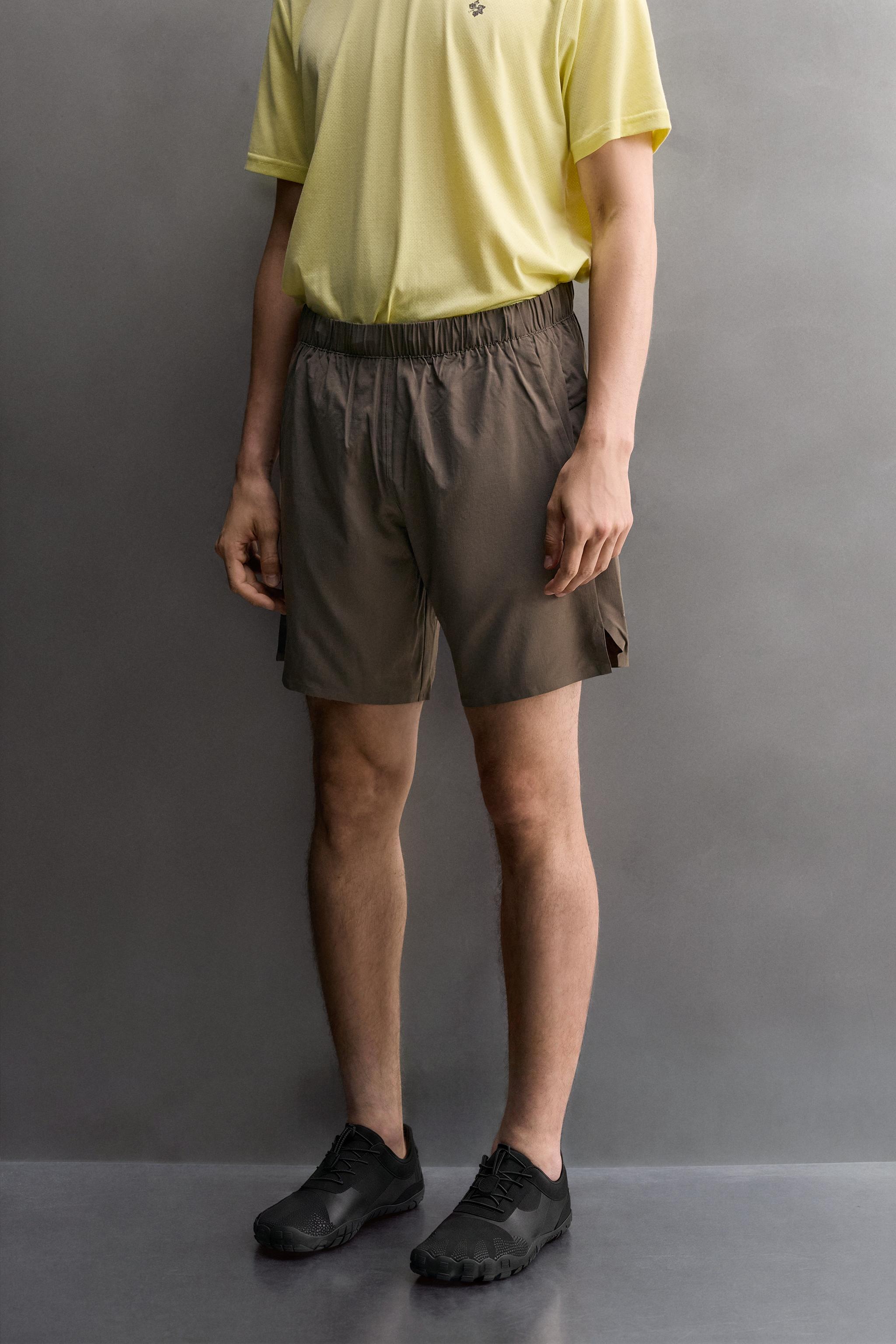 9" TRAINING SHORTS — Dark brown