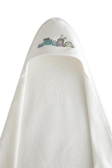 TOALLA BAÑO CAPUCHA BEBÉ MONSTERS, INC. - Blanco roto de Zara