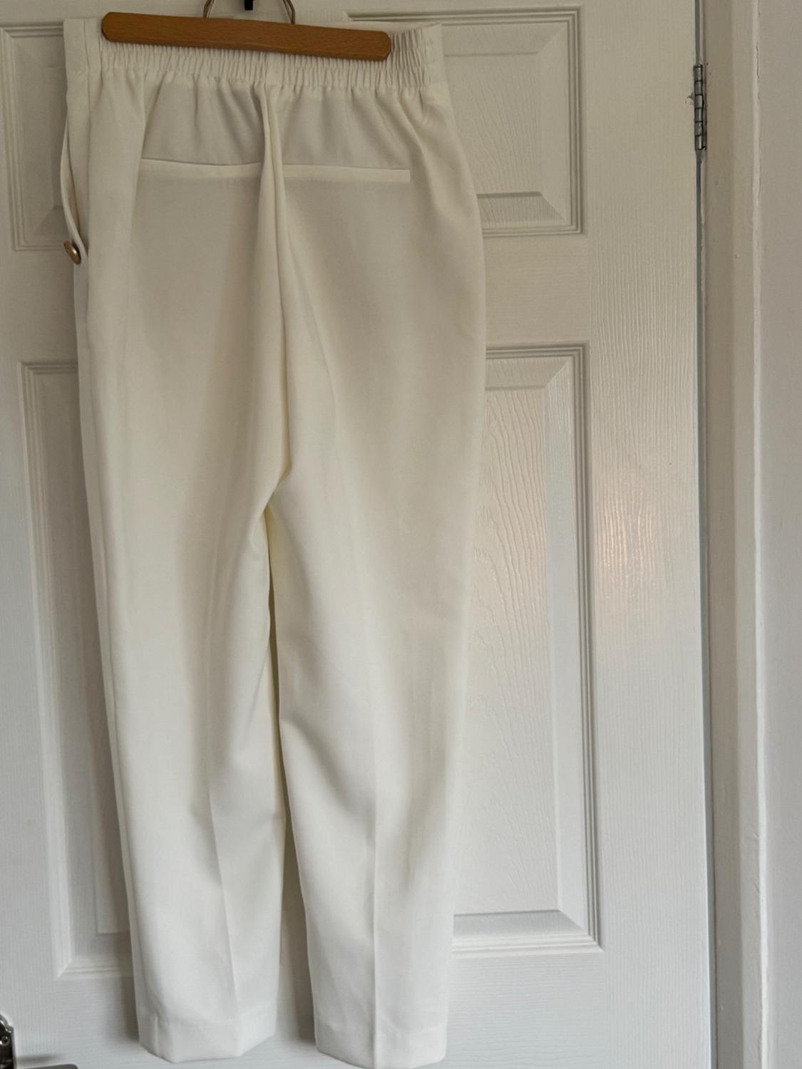 STRAIGHT TROUSERS WITH METAL BUTTONS - Image 2
