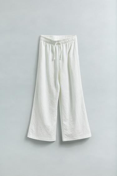 PANTALON FLUIDE À JAMBES LARGES - Écru de Zara - Image 4