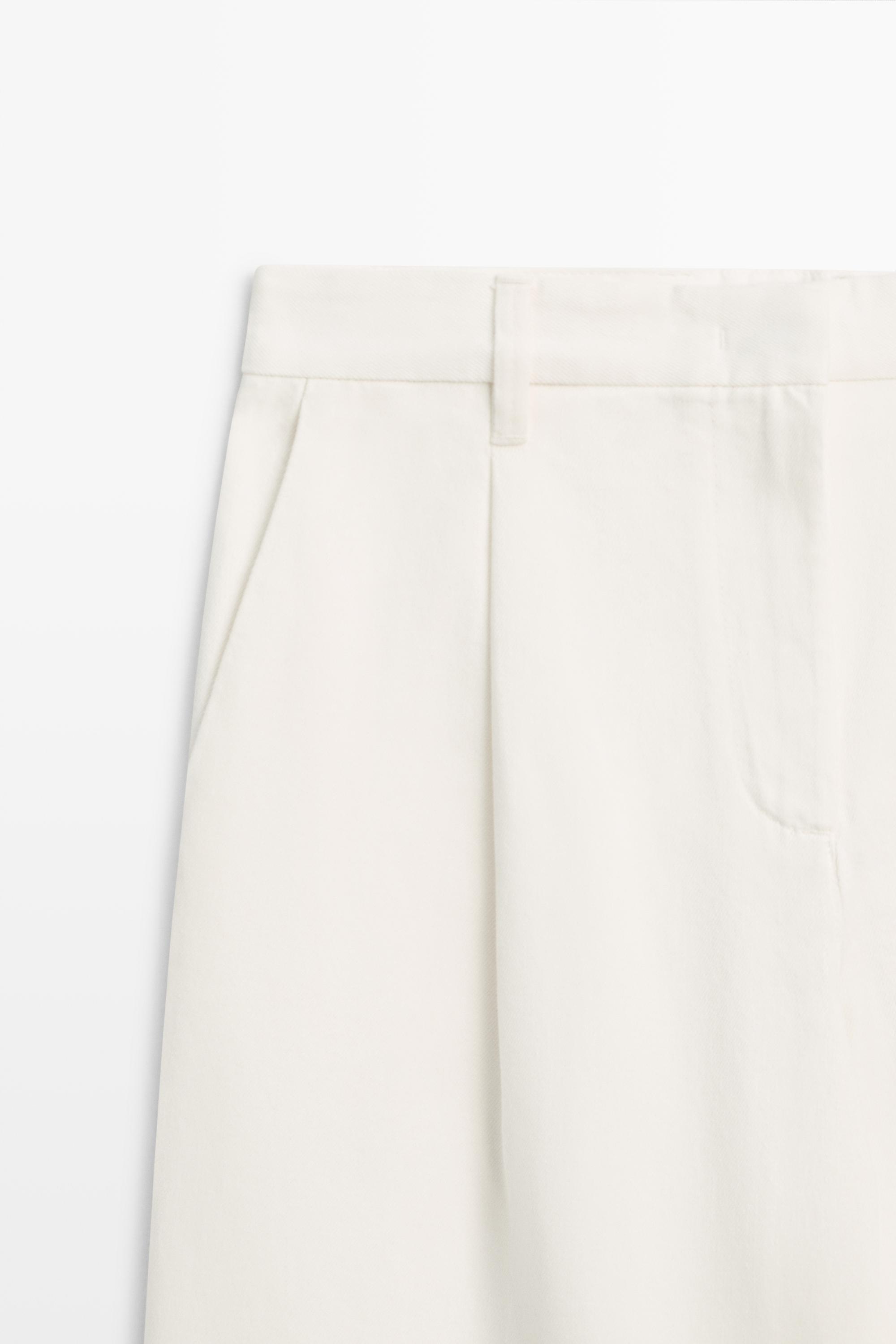Pantalon wide leg taille basse à pinces
