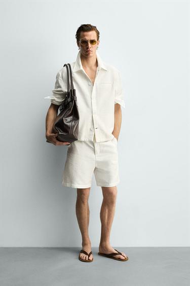 SOBRECAMISA FLUIDA RELAXED FIT - Blanco roto de Zara - Imagen 0