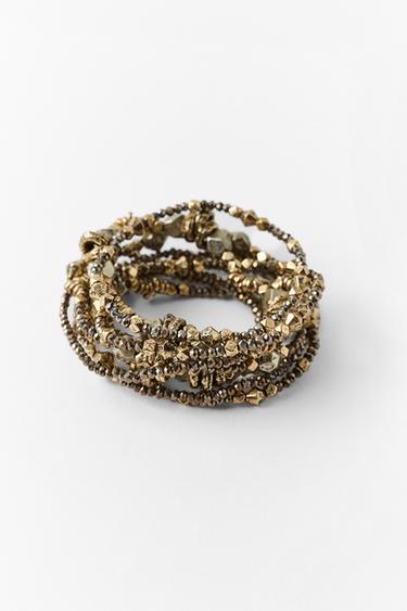 PACK OF 9 ELASTICATED MIXED PIECE BRACELETS - Aged gold by Zara