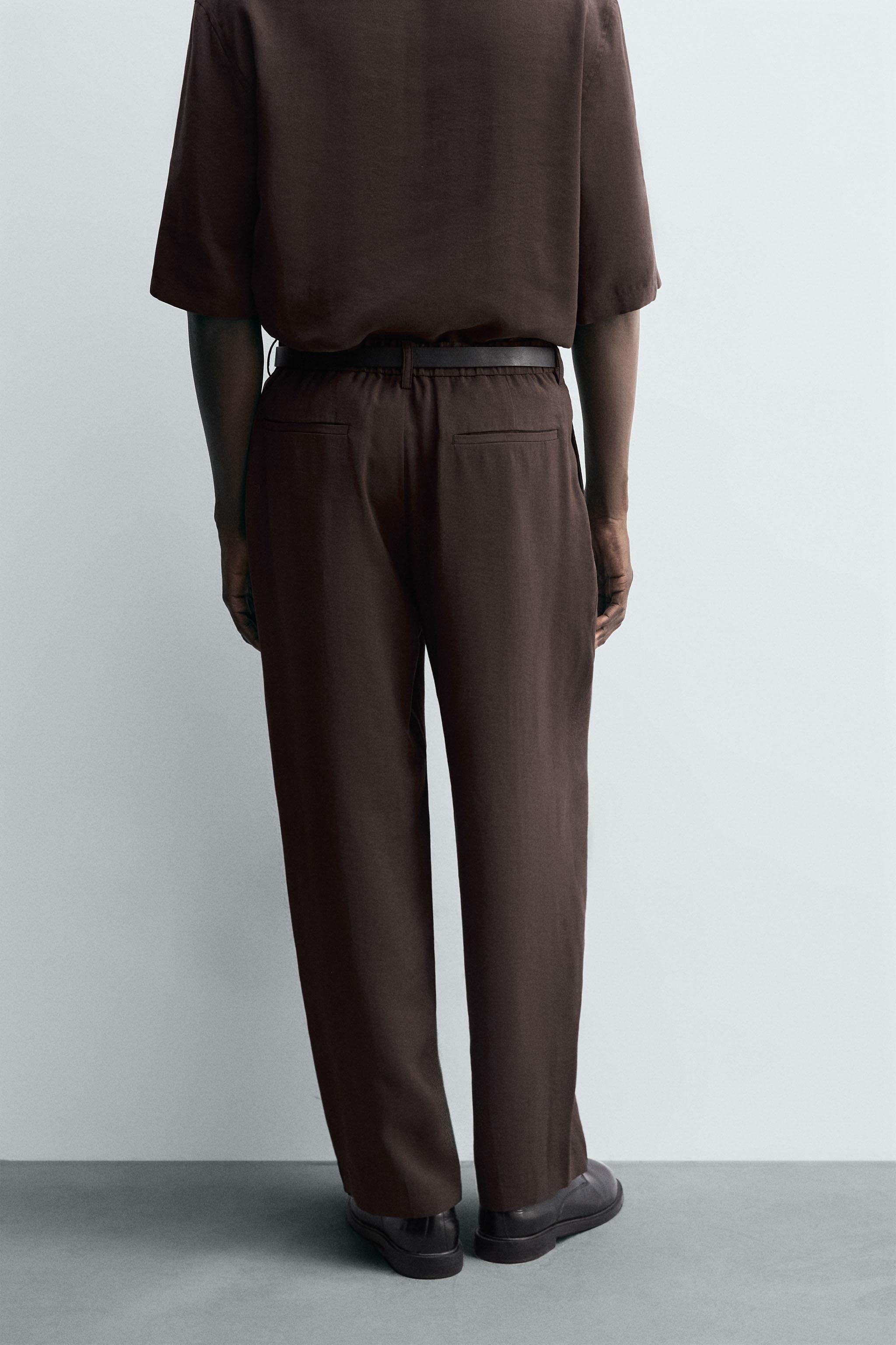 FLOWY PLEATED PANTS