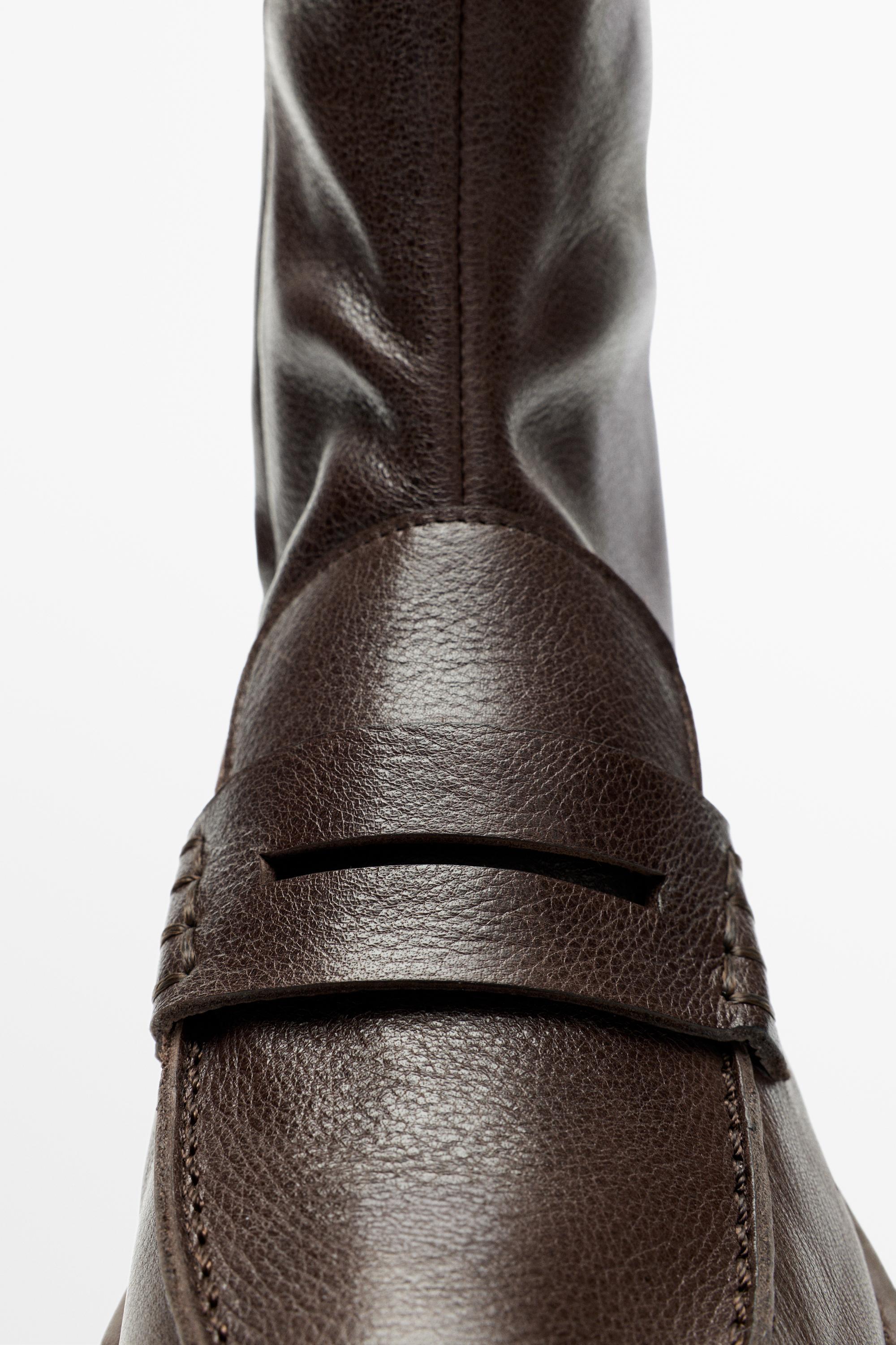 Ankle soft leather loafer with vamp strap