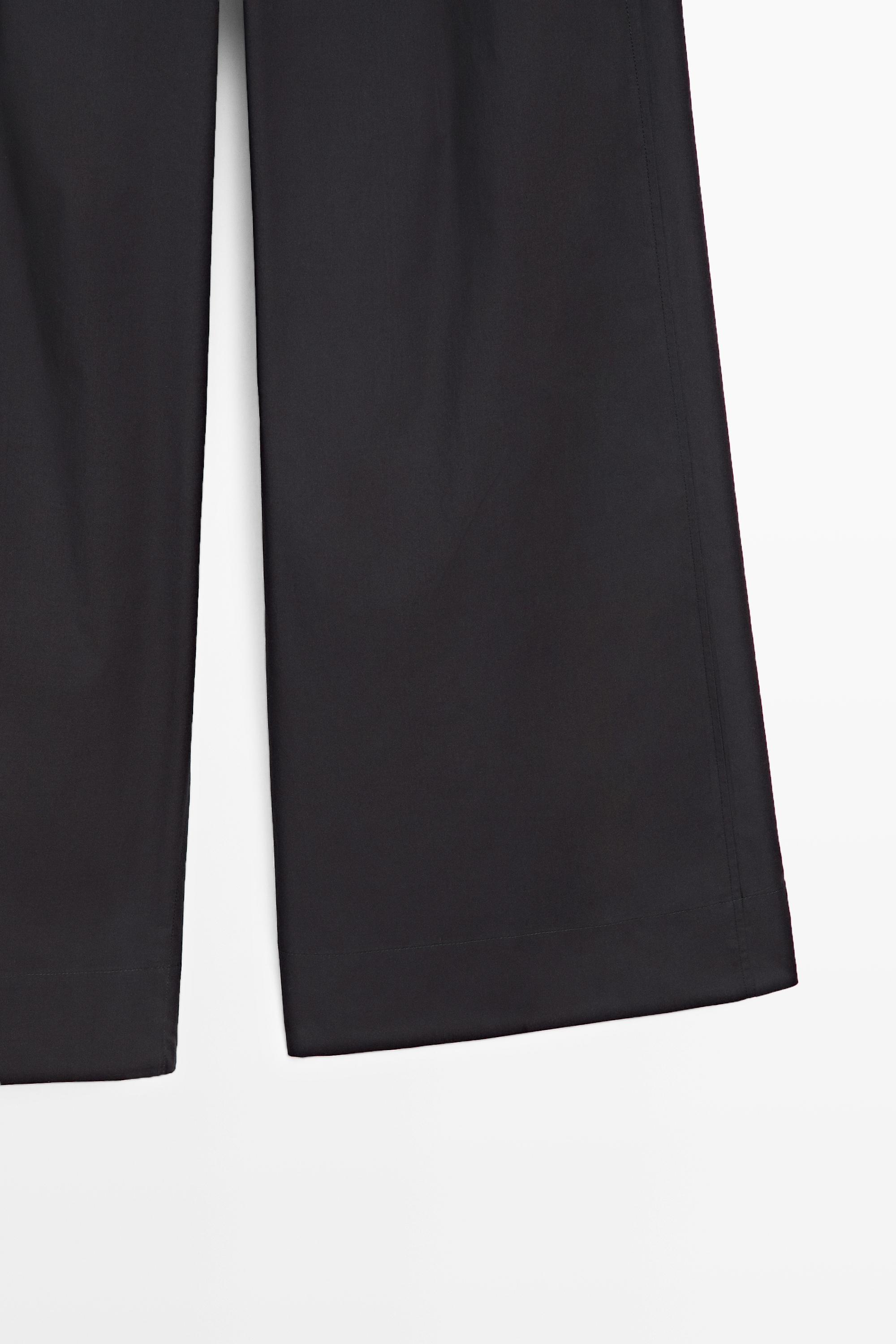 Cotton blend wide-leg pleated trousers
