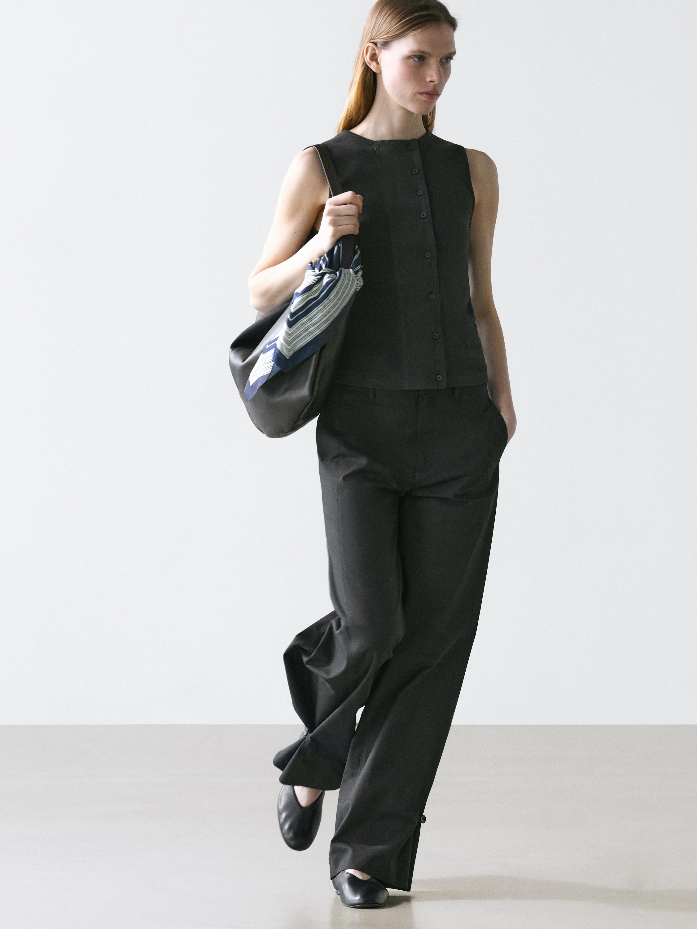 Cotton blend trousers with hem detail