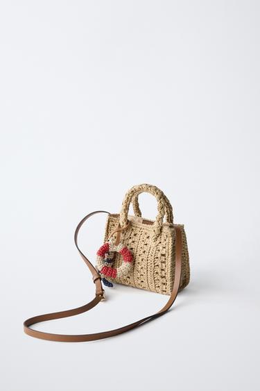 SAC BANDOULIÈRE EN RAFIA AVEC BRELOQUES MARINES - Blanc écru de Zara - Image 1