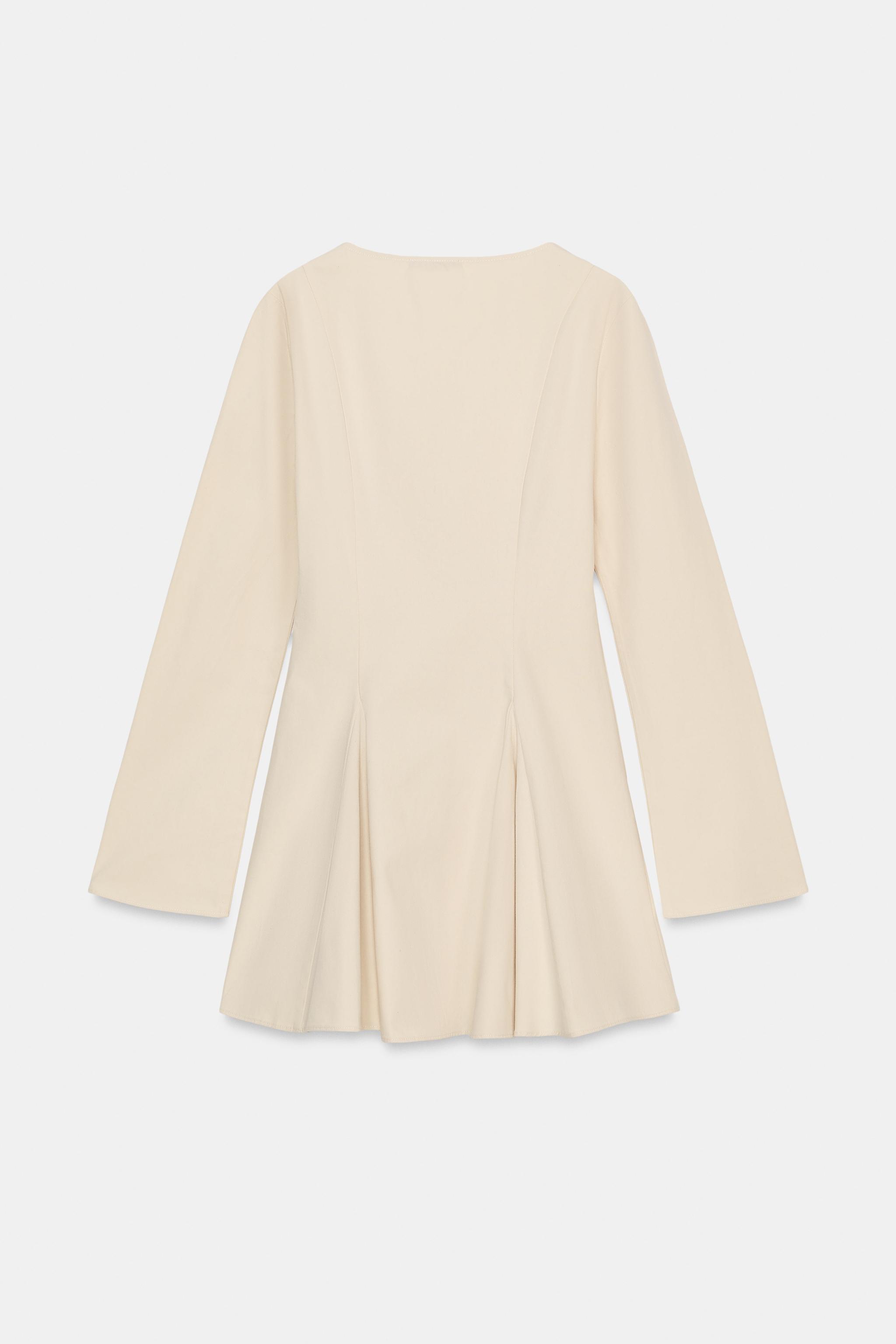 ROBE COURTE JUPE ÉVASÉE