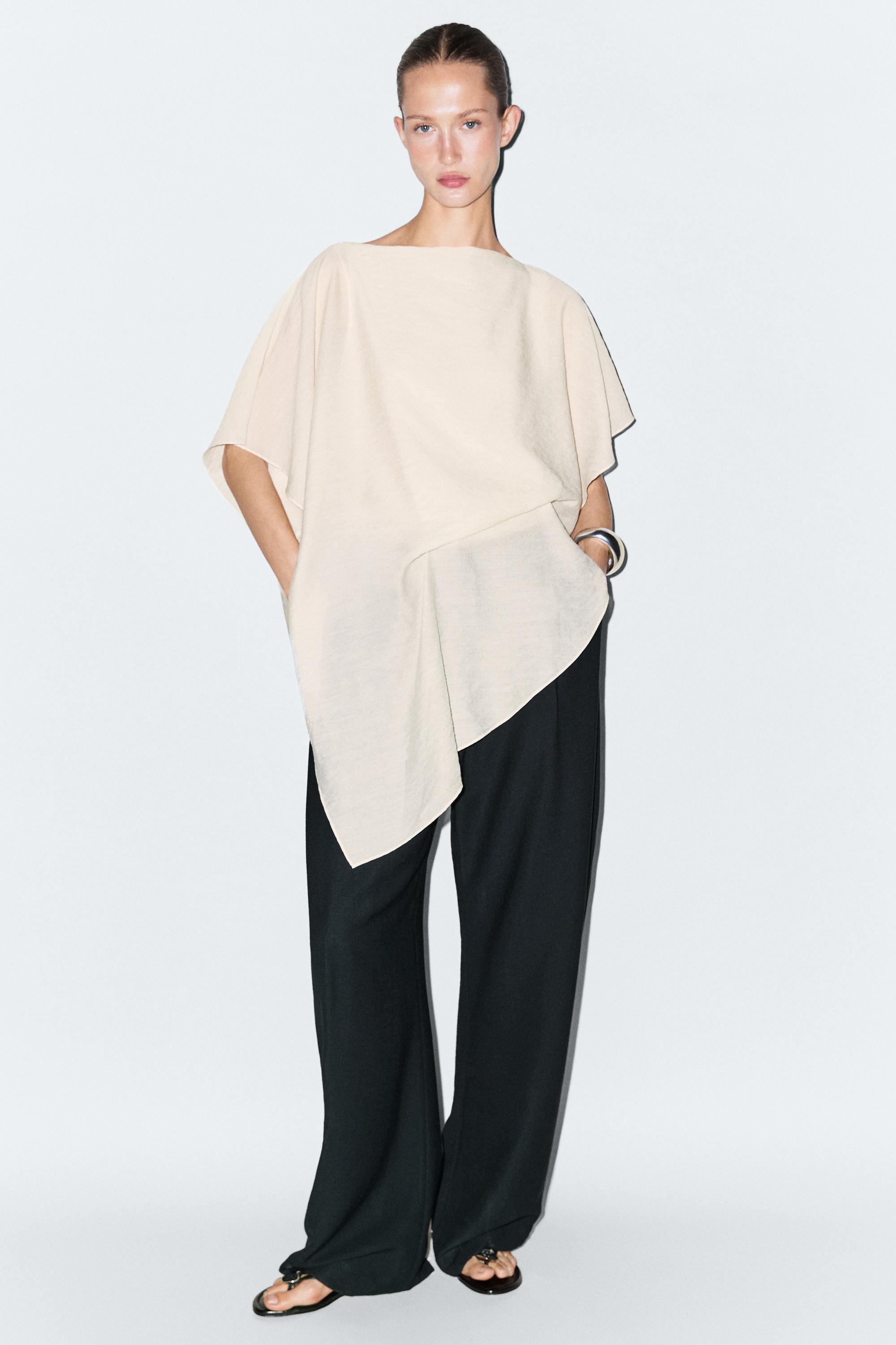 Asymmetric cape-style flowing blouse